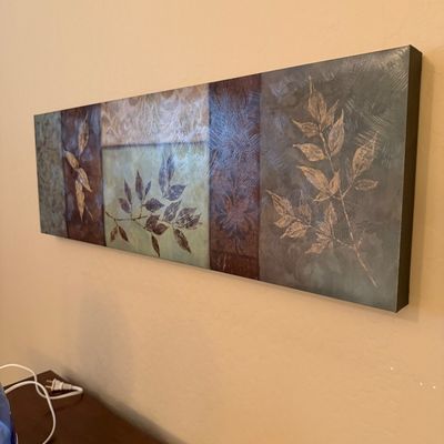 Sale Photo Thumbnail #148: Contemporary horizontal wrapped canvas wall art featuring textured botanical leaf motifs in muted earth tones.