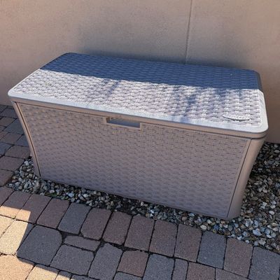 Sale Photo Thumbnail #234: Suncast plastic outdoor deck storage box with a faux-wicker weave pattern in light grey.