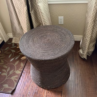 Sale Photo Thumbnail #14: Contemporary dark brown woven rope hourglass stool or side table with spiral top detailing.