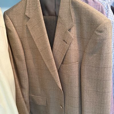 Sale Photo Thumbnail #93: Men's tan tweed sport coat featuring a subtle windowpane and herringbone pattern.