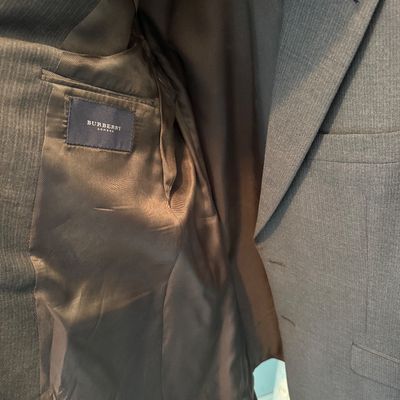 Sale Photo Thumbnail #99: Men's charcoal grey pinstripe Burberry London suit jacket.
