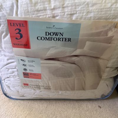Sale Photo Thumbnail #118: Home Classics Level 3 warmth full/queen size down comforter in its original plastic packaging.