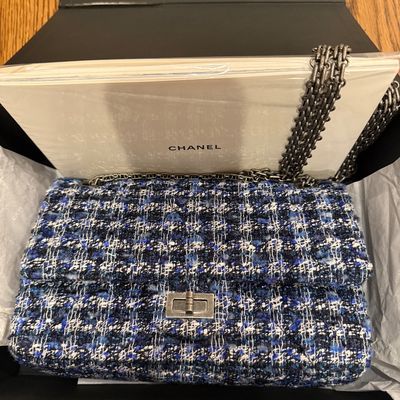 Sale Photo Thumbnail #9: Chanel 2.55 Reissue flap bag in a blue, black, and white tweed knit, featuring ruthenium-tone chain straps and Mademoiselle turn-lock closure. Presented inside its original black Chanel box with tissue paper and printed material.  Excellent/unused conditi