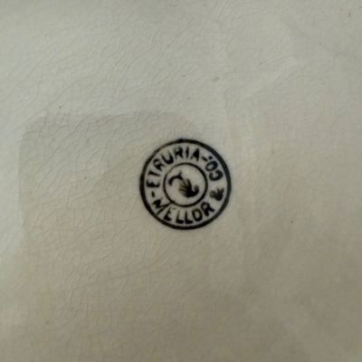 Sale Photo Thumbnail #68: Maker's mark for Etruria & Co. Mellor stamped on the underside of a crazed ceramic piece.