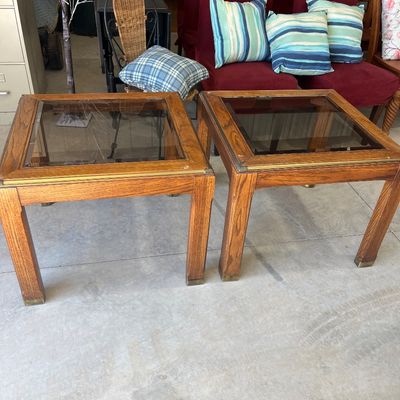 Sale Photo Thumbnail #7: Pair of vintage oak end tables with glass top inserts and brass trim details.