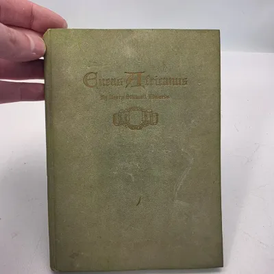 Vintage copy of 'Eneas Africanus' by Harry Stillwell Edwards, featuring a muted green hardcover with embossed gilded lettering...