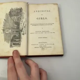 Antique 1854 book titled "Anecdotes for Girls" by Harvey Newcomb, published by Gould and Lincoln. The open volume displays...