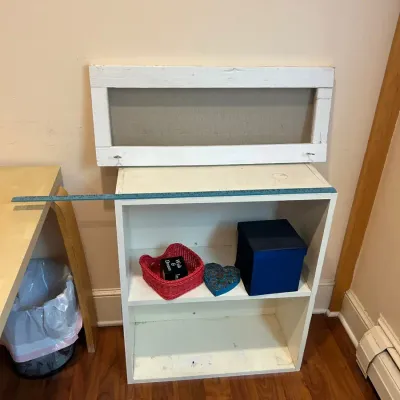 White Bookcase with Decorative Accessories ($7.81)