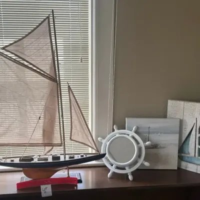 Nautical Decor Collection: Model sailboat with accompanying nautical themed items. ($7.81)