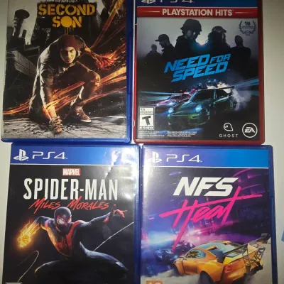 Sale Photo Thumbnail #63: A collection of 4 video games for the PlayStation 4 (PS4) platform. Included titles are:
- Marvel Spider-Man: Miles Morales
- Need for Speed Heat
- Need for Speed (PlayStation Hits)
- inFAMOUS Second Son

All games are in original plastic cases. Cases sho