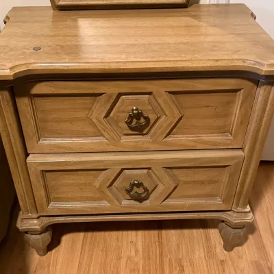 Sale Photo Thumbnail #118: Vintage light oak nightstand featuring two drawers with hexagonal paneled details and brass bail pulls.