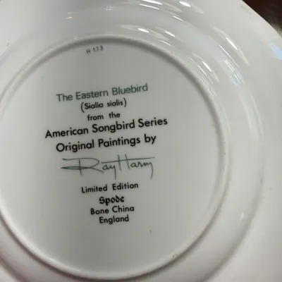 Sale Photo Thumbnail #209: Backside maker's mark on a Spode bone china collector plate, featuring "The Eastern Bluebird" from the American Songbird Series by Ray Harm.
