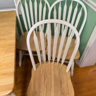 Sale Photo Thumbnail #169: Set of three two-tone Windsor-style dining chairs featuring white painted arrow-back spindles and frames with natural wood finished seats.