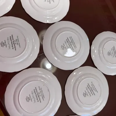 Sale Photo Thumbnail #218: Collection of Spode bone china collector plates from the American Songbird Series featuring artwork by Ray Harm, showing the back maker's marks.