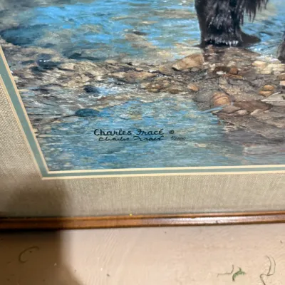 Sale Photo Thumbnail #396: Framed wildlife art print depicting a bear in a stream, hand-signed and numbered 4/2500 by artist Charles Fracé.