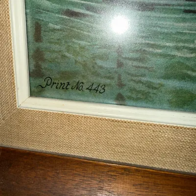 Sale Photo Thumbnail #38: Close-up detail of framed vintage art print marked 'Print No. 443' in the corner with a burlap-lined wooden frame.