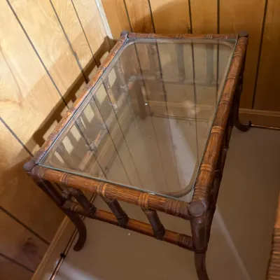 Sale Photo Thumbnail #406: Vintage faux bamboo side table with a clear glass insert top and dark stained wood frame.