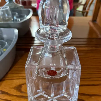 Sale Photo Thumbnail #331: Vintage Godinger crystal liquor decanter with an oversized pointed stopper and hanging silver-tone decanter label.