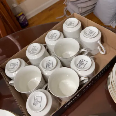 Sale Photo Thumbnail #305: Boxed set of vintage Royal Majestic Fine China teacups with gold rim detailing.