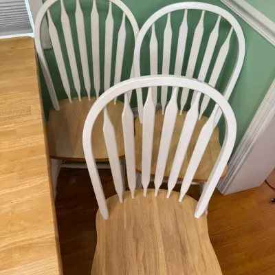 Sale Photo Thumbnail #172: Set of three two-tone Windsor-style dining chairs featuring white painted arrow-back spindles and natural light oak seats.