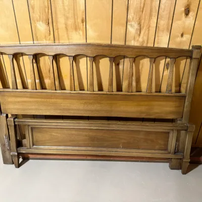 Sale Photo Thumbnail #380: Mid-century wooden headboard and footboard set featuring a spindled upper rail design.
