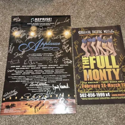 Two autographed musical theater posters, including Reprise! Broadway's Best "Applause" and Musical Theatre West's...