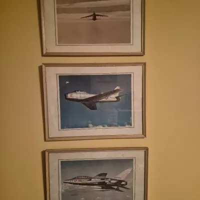 Set of three framed aviation art prints featuring U.S. Air Force fighter jets, matted and presented in matching metallic frames.
