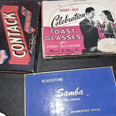 Collection of mid-20th-century vintage games and novelty items in original boxes, including Parker Brothers Contack, Maude B. May...