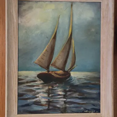 Framed vintage oil painting depicting a sailboat on calm waters, signed by A. W. Bassford and dated 1953.
