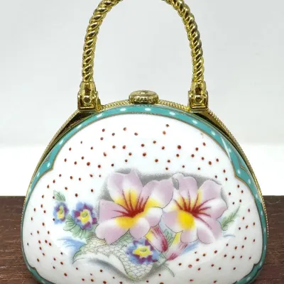 Sale Photo Thumbnail #120: Lot 120: Handbag / purse trinket box