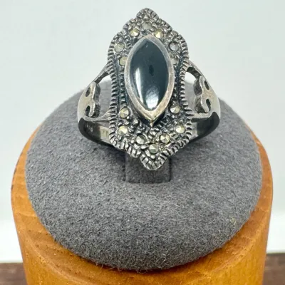 Sale Photo Thumbnail #94: Lot 94: Sterling black onyx & marcasite sterling silver ring