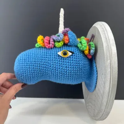 Sale Photo Thumbnail #212: Lot 212 Crocheted Unicorn wall piece