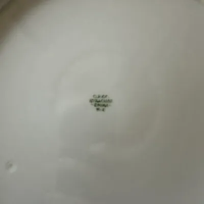 Sale Photo Thumbnail #595: Bottom stamp of an O.P. Co. Syracuse China ceramic plate or platter.