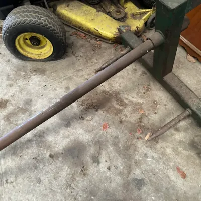 Sale Photo Thumbnail #219: Heavy-duty 3-point hitch bale spear for a tractor, featuring a long main spike and two stabilizing tines.