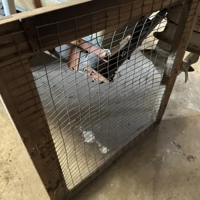 Sale Photo Thumbnail #211: Vintage handmade square wooden frame with wire mesh screen, displaying rustic wear.