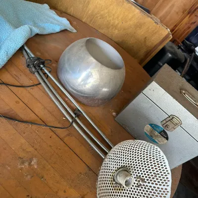 Sale Photo Thumbnail #727: Mid-century modern silver dome floor lamp disassembled alongside a vintage metal Porta-File box.