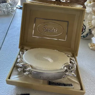 Sale Photo Thumbnail #385: Vintage Speidel identification bracelet with a sterling silver plaque and stainless steel curb chain, presented in its original satin-lined display box.