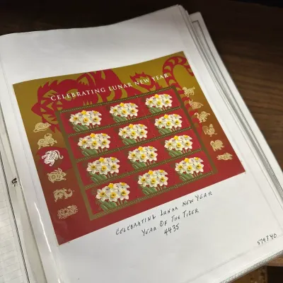 Sale Photo Thumbnail #107: USPS Celebrating Lunar New Year: Year of the Tiger souvenir stamp sheet mounted in a protective binder page.