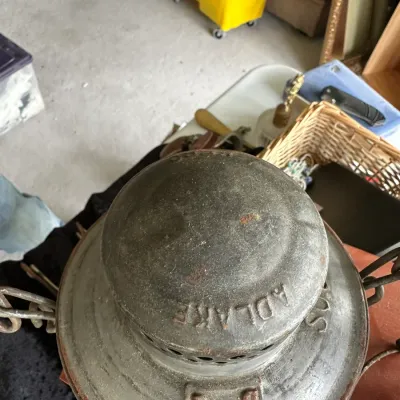 Sale Photo Thumbnail #230: Vintage Adlake metal railroad lantern cap featuring embossed lettering and light surface rust.
