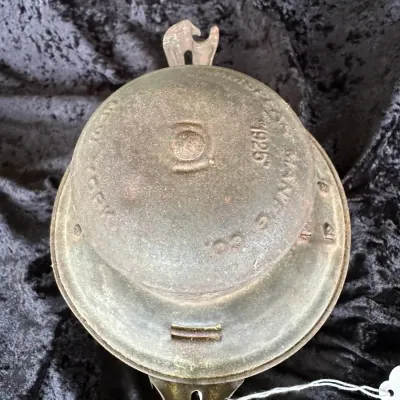 Sale Photo Thumbnail #227: Antique brass or bronze railroad signal lamp burner component, stamped with manufacturing details and a 1925 date.