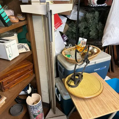 Sale Photo Thumbnail #67: Vintage Detecto physician's balance beam scale with attached height rod, standing in a room with various household items.