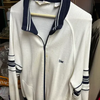 Sale Photo Thumbnail #84: Vintage Christian Dior Monsieur zip-up track jacket in white acrylic knit with navy blue striped trim and embroidered Dior chest logo.