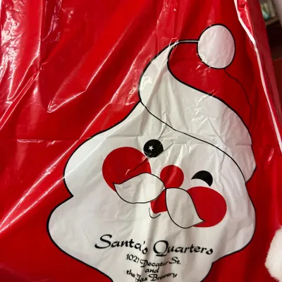 Sale Photo Thumbnail #24: Vintage Santa's Quarters red plastic shopping bag featuring a Santa Claus graphic and New Orleans business address.