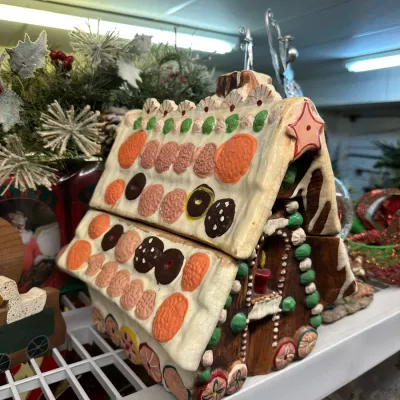 Sale Photo Thumbnail #72: Hand-painted ceramic gingerbread house cookie jar with detailed candy and frosting embellishments.