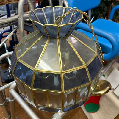 Sale Photo Thumbnail #28: Vintage brass and leaded glass hanging pendant lamp featuring clear and blue tinted glass panels with a chain hanger.