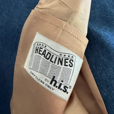 Sale Photo Thumbnail #609: Vintage tan-lined denim jacket featuring an interior 'Headlines by h.i.s.' brand woven label.