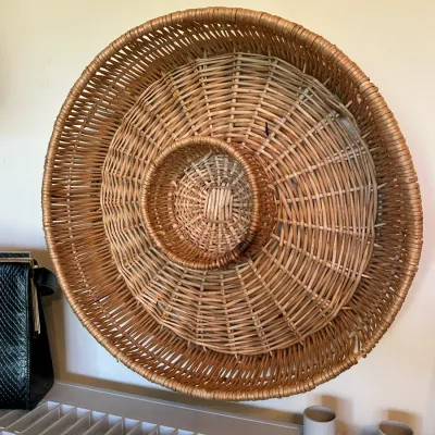 Sale Photo Thumbnail #676: Vintage wicker chip and dip basket tray featuring a raised center bowl and concentric woven rings.