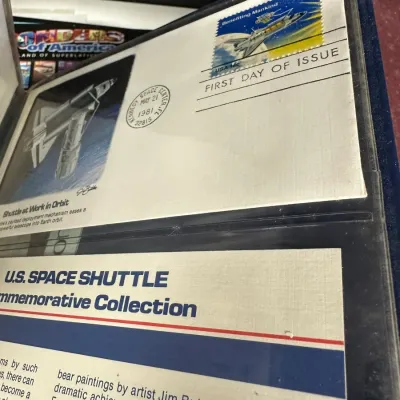 Sale Photo Thumbnail #95: 1981 U.S. Space Shuttle Commemorative Collection first day cover featuring a 'Benefiting Mankind' 18-cent stamp postmarked at Kennedy Space Center.
