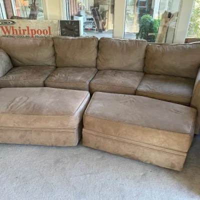 Sale Photo Thumbnail #372: Large four-cushion microfiber sofa in tan with two matching oversized ottomans.