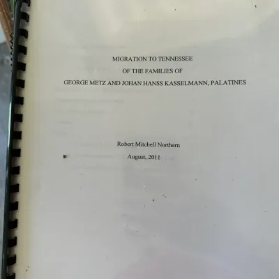 Sale Photo Thumbnail #449: Spiral-bound genealogical research document titled "Migration to Tennessee of the Families of George Metz and Johan Hanss Kasselmann, Palatines" by Robert Mitchell Northern, dated August 2011.